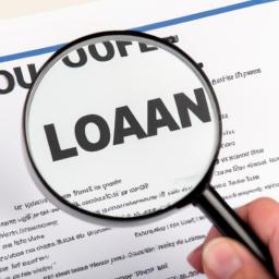 Close-up of a person examining an FHA loan document before refinancing.