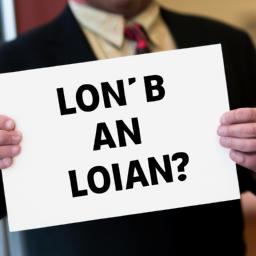 An eye-catching sign inviting inquiries for business loans.